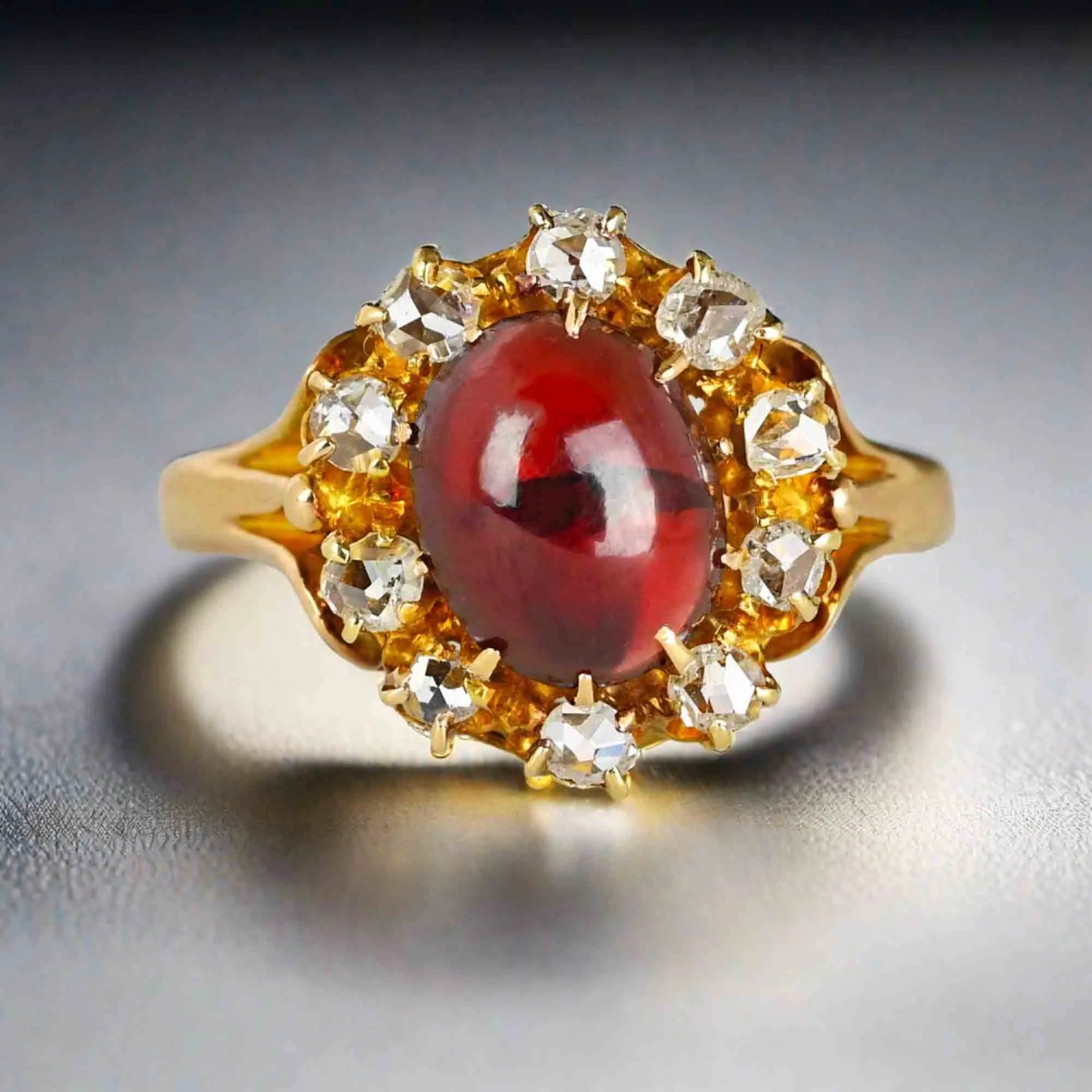 Antique Rose Cut Diamond Halo Garnet Cabochon Ring