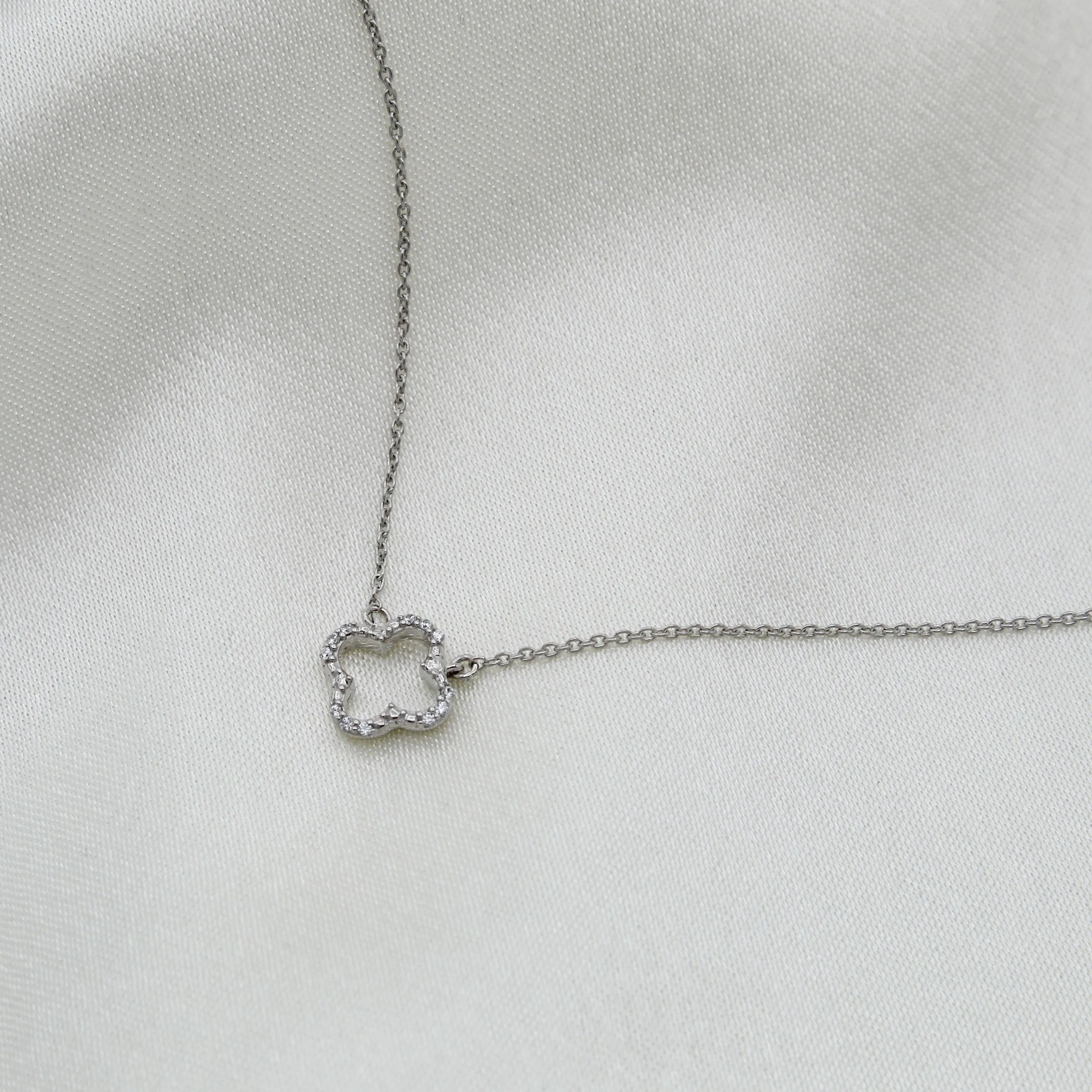 Open Four Leaf Clover 1/20 Cttw Natural Diamond Pendant Necklace set in 925 Sterling Silver