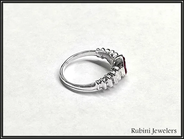 Ribbed shoulder oval garnet ring